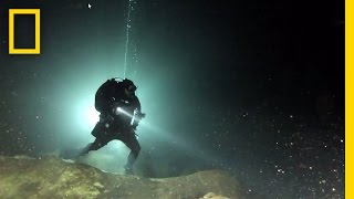 Diving in a Sacred Maya Cave  National Geographic [upl. by Acirne119]