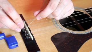 How to Change an Acoustic Guitar String EASY [upl. by Ahsain]