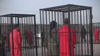 ISIS releases video of Peshmerga fighters in cages [upl. by Belicia504]