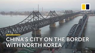 Dandong Chinas border city with North Korea [upl. by Brita]